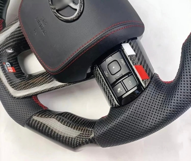 TOYOTA Hilux (2012-2024) - Carbon Fiber + Leather Steering Wheel with Airbag and Buttons